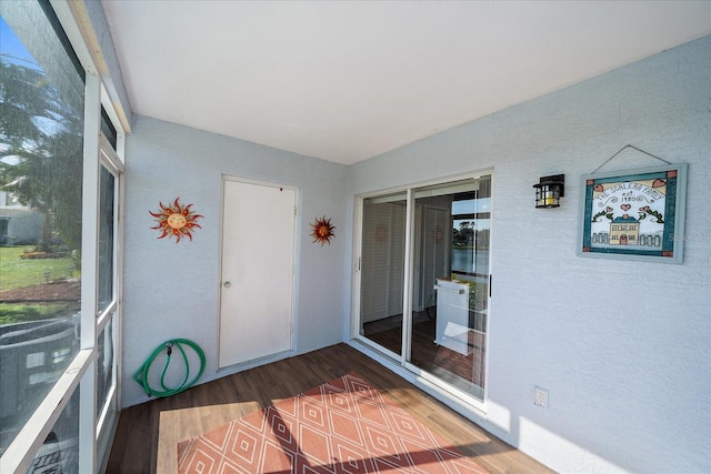 unfurnished sunroom featuring plenty of natural light