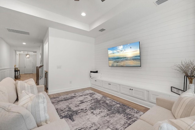 living room with light hardwood / wood-style floors