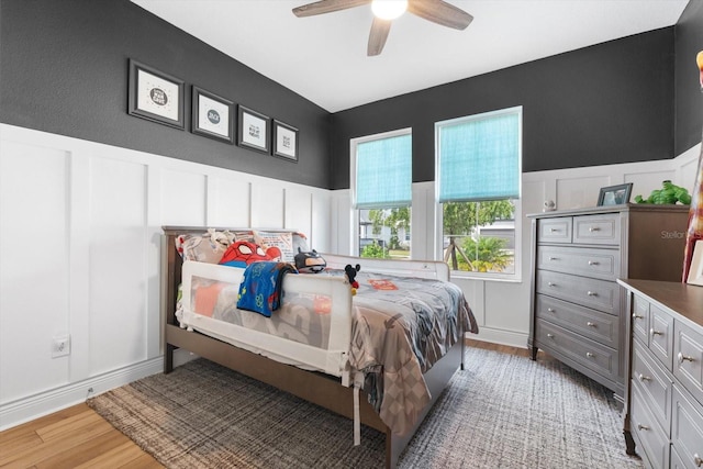 bedroom featuring hardwood / wood-style floors and ceiling fan