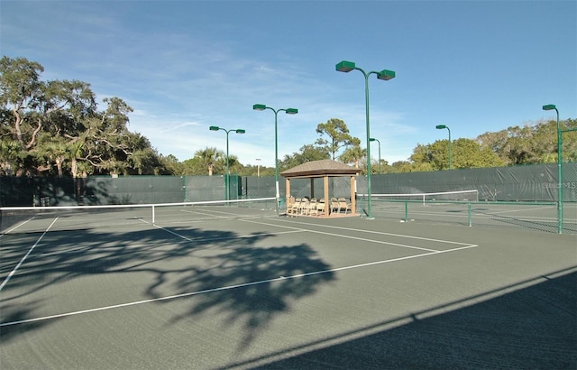 view of sport court with a gazebo