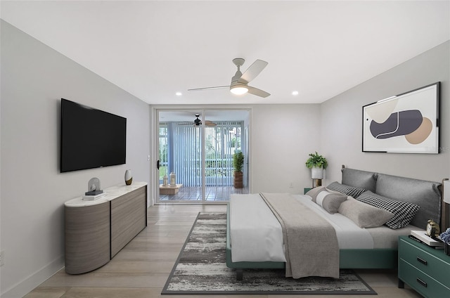 bedroom with access to exterior, ceiling fan, light wood-type flooring, expansive windows, and recessed lighting