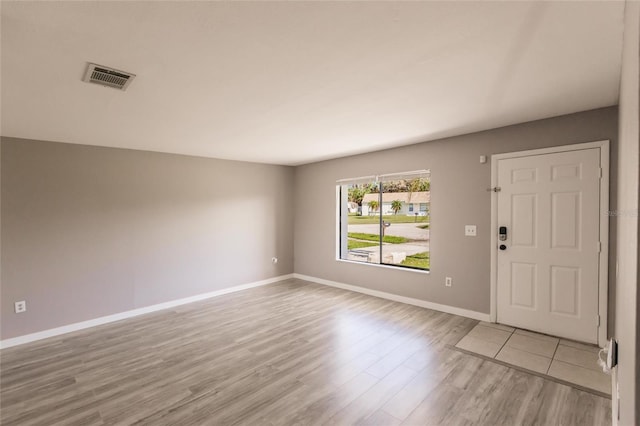 entrance foyer featuring light wood-type flooring