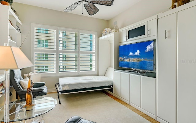 bedroom featuring ceiling fan and light wood-type flooring