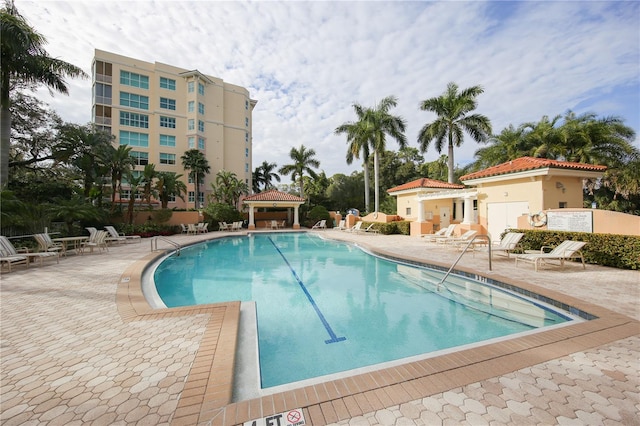 view of swimming pool with a gazebo and a patio area