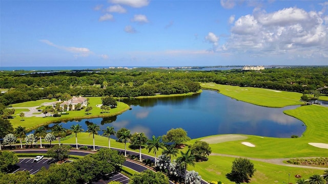 aerial view with a water view and golf course view
