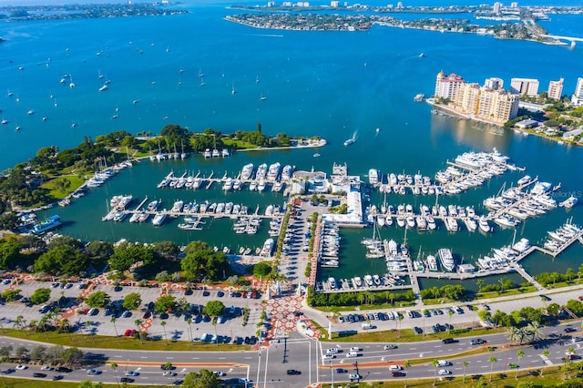 birds eye view of property featuring a water view