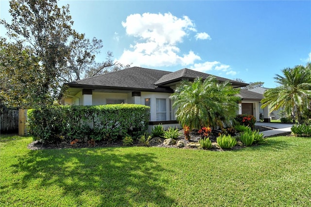 view of front of house with a front lawn