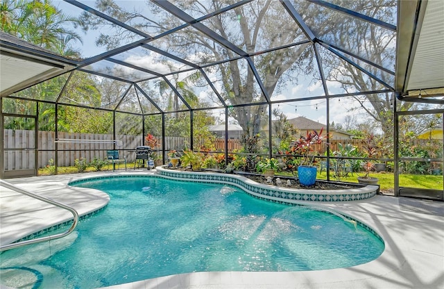 view of pool featuring a patio area and a lanai