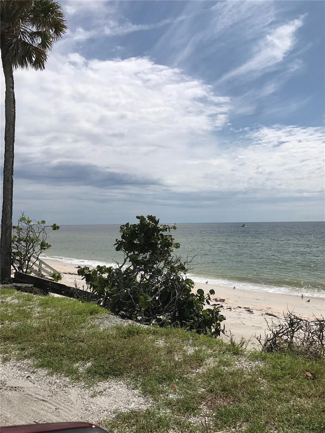 view of water feature with a beach view