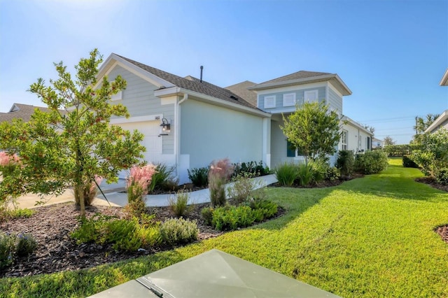 view of property exterior featuring a garage and a lawn