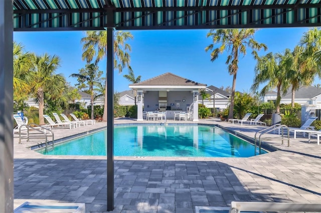 view of pool featuring a patio area