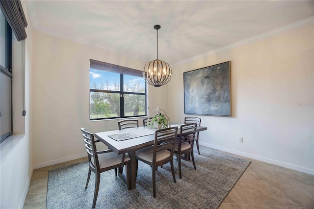 dining area featuring tile patterned flooring, a notable chandelier, and crown molding