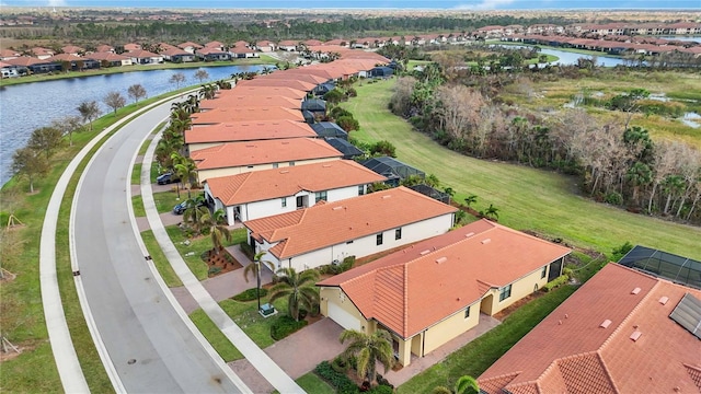 bird's eye view with a water view