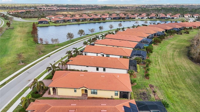 bird's eye view with a water view