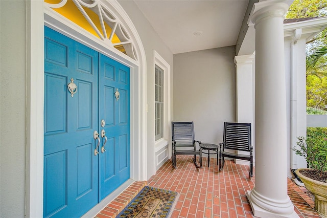 doorway to property with a porch