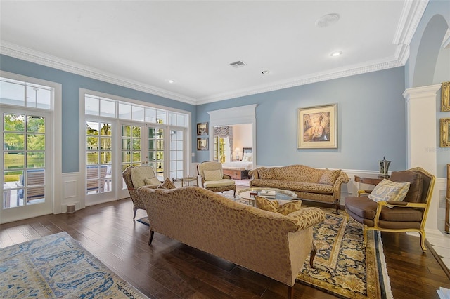 living room featuring ornamental molding, french doors, and dark hardwood / wood-style floors