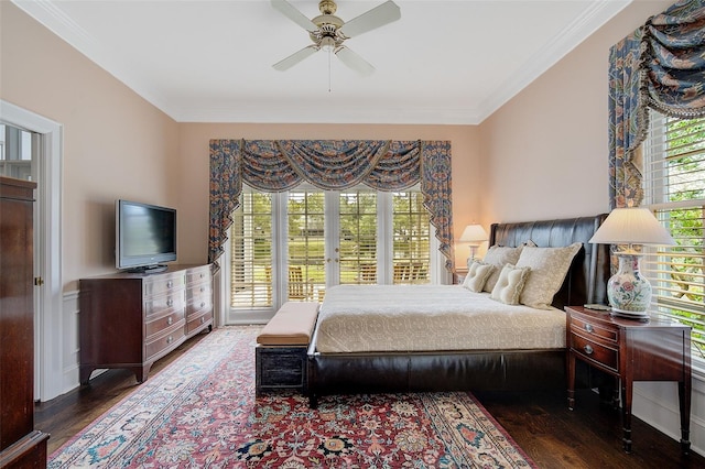 bedroom featuring ceiling fan, crown molding, and dark hardwood / wood-style floors