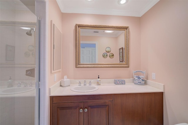 bathroom with a shower with door, vanity, and ornamental molding