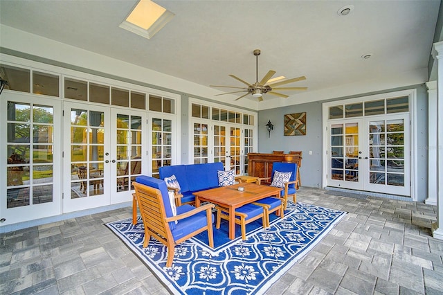 view of patio with french doors and ceiling fan