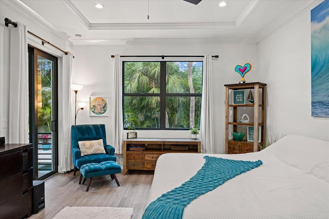 577 Venice Ln, Sarasota, FL 34242 - bedroom with a raised ceiling, light wood-type flooring, access to outside, ornamental molding, and recessed lighting