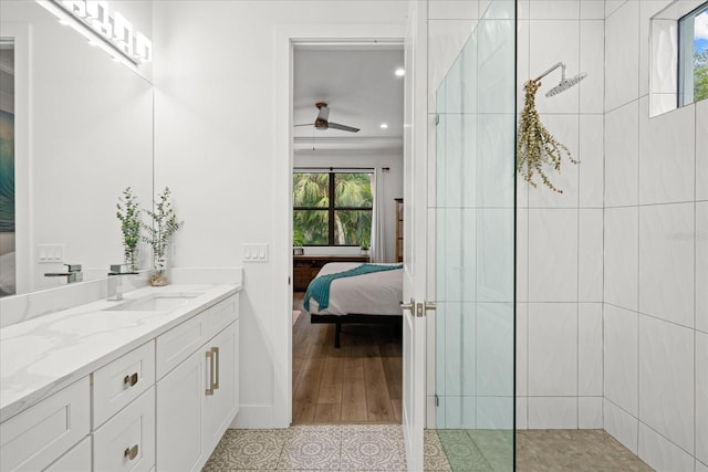 577 Venice Ln, Sarasota, FL 34242 - full bathroom with ensuite bath, vanity, a ceiling fan, a tile shower, and recessed lighting