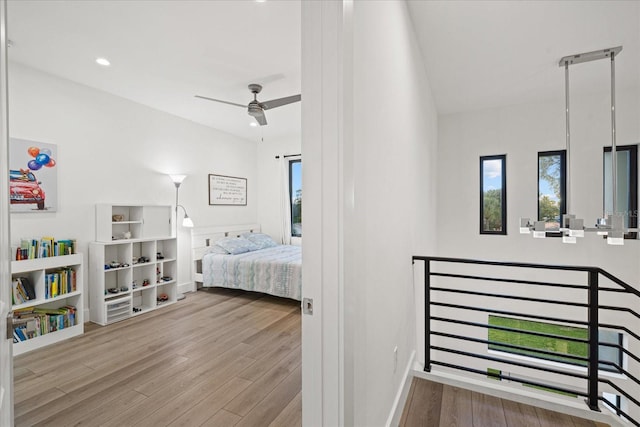 577 Venice Ln, Sarasota, FL 34242 - bedroom featuring wood finished floors