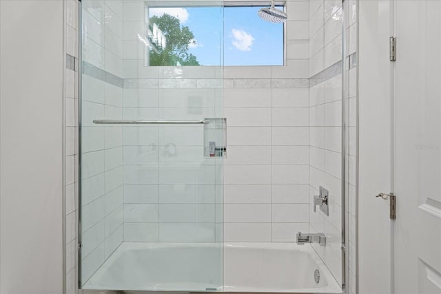 577 Venice Ln, Sarasota, FL 34242 - bathroom with combined bath / shower with glass door