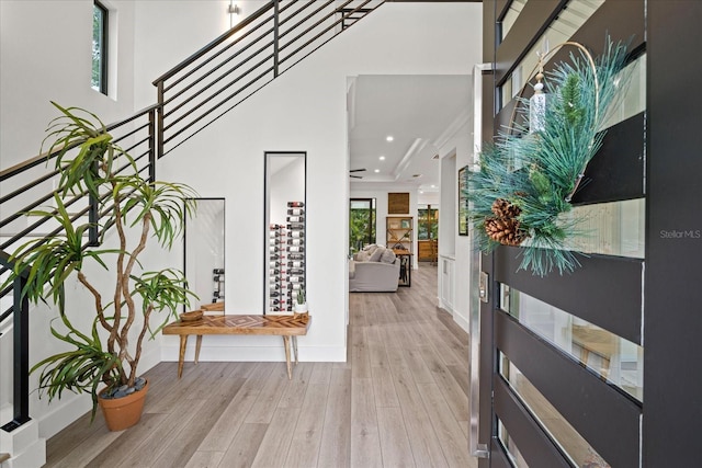 entryway with light hardwood / wood-style floors