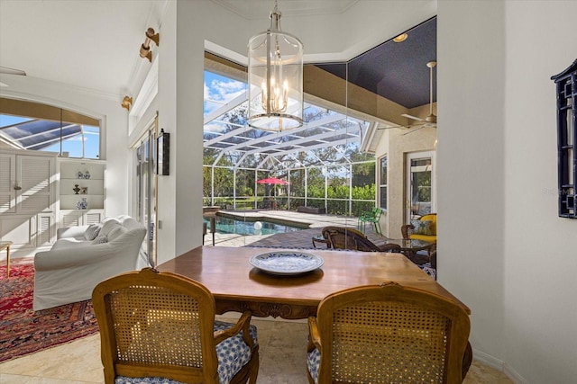 dining area featuring ornamental molding, a wealth of natural light, and light tile patterned floors