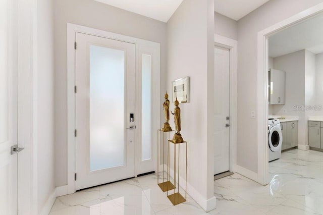 foyer featuring washer / clothes dryer