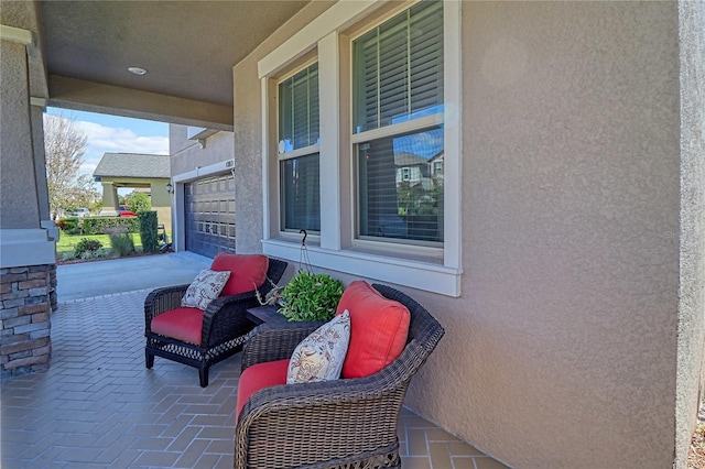 view of patio featuring covered porch