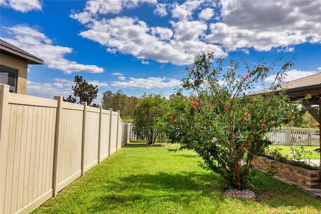 view of yard featuring fence