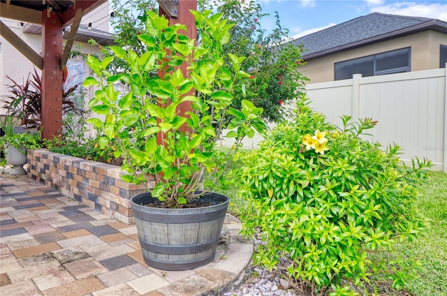 view of patio / terrace featuring fence