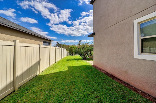 view of yard featuring fence