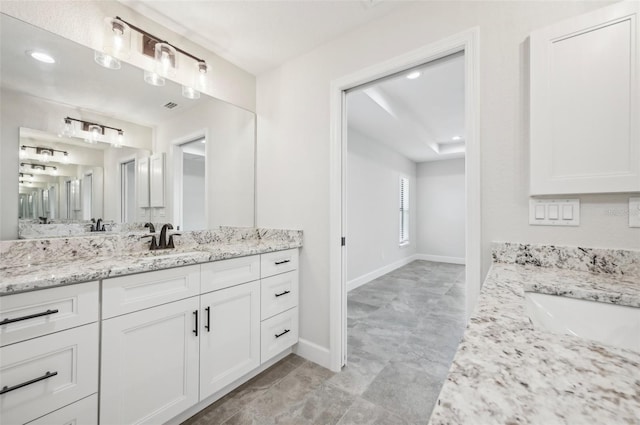 bathroom featuring vanity