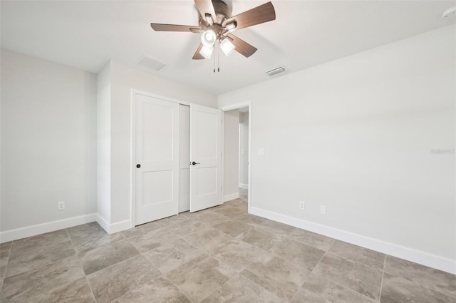 unfurnished bedroom with a closet and ceiling fan