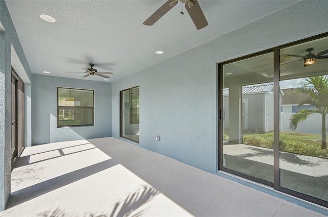 view of patio with ceiling fan