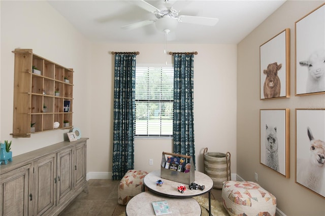 dining room featuring ceiling fan and light tile patterned floors