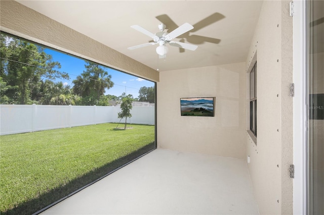 interior space featuring ceiling fan