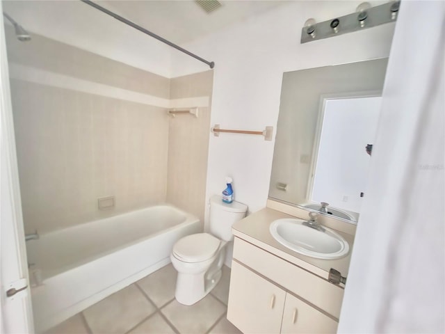 full bathroom featuring toilet, vanity, washtub / shower combination, and tile patterned flooring