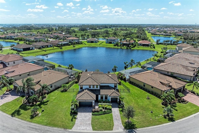 bird's eye view with a water view