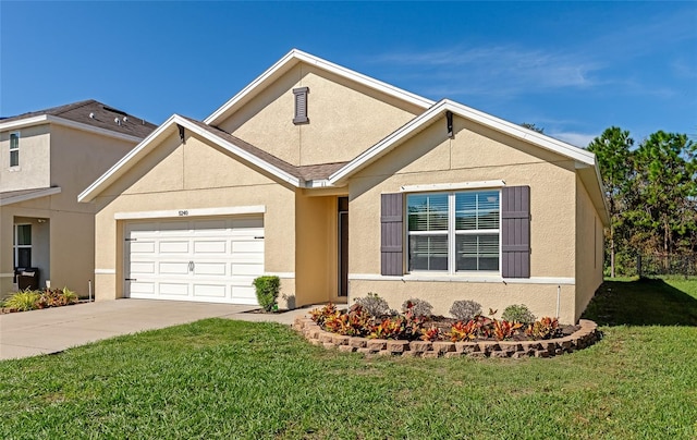 view of front of home with a garage and a front lawn