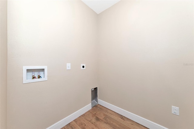 laundry room featuring hardwood / wood-style flooring, hookup for a washing machine, and hookup for an electric dryer