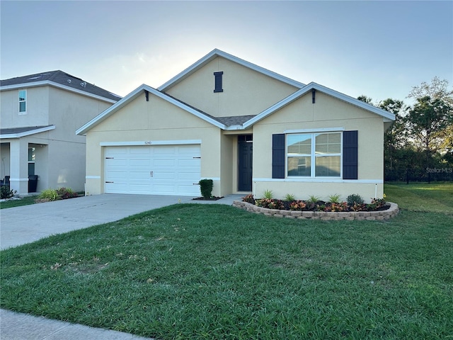 single story home with a front yard and a garage