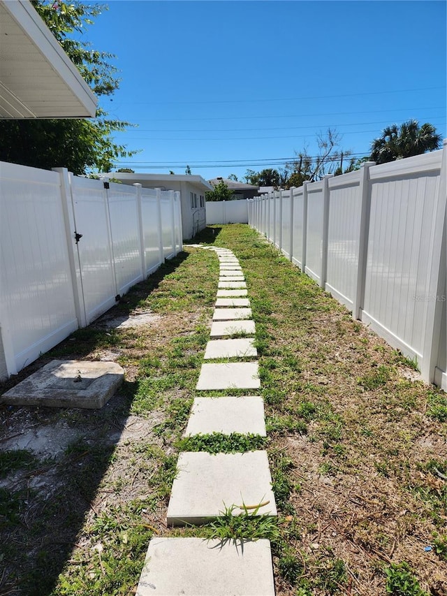 view of yard featuring a fenced backyard