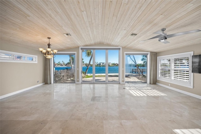 spare room featuring vaulted ceiling, wood ceiling, and a wealth of natural light