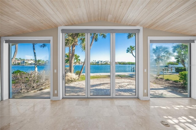 doorway featuring vaulted ceiling, wood ceiling, and a water view