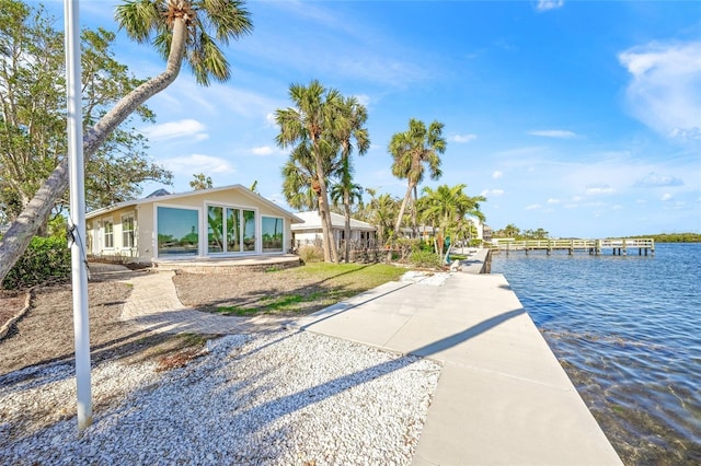 exterior space with a water view