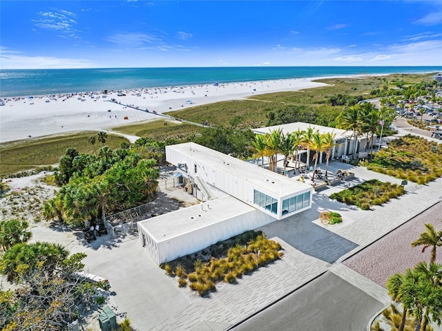 aerial view featuring a water view and a beach view