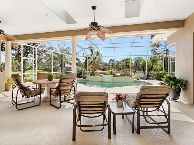 exterior space with a healthy amount of sunlight and a swimming pool with hot tub